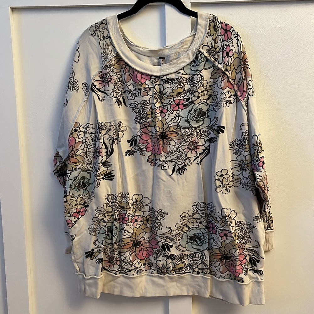 Free people sweatshirt with floral pattern. Size small.